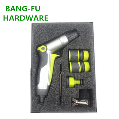 Adjustable plastic garden hose nozzle with thumb flow control